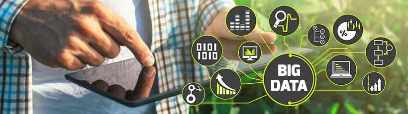 a fusão da agricultura moderna com a tecnologia de ponta. Em primeiro plano, vemos as mãos de um agricultor