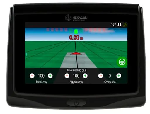 display de agricultura de precisão da marca Hexagon Agriculture, provavelmente instalado na cabine de um tr