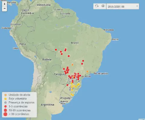 Mapa de monitoramento da ferrugem da soja no Brasil, com focos da doença indicados por pontos coloridos.