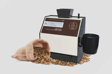 medidor de umidade de grãos, modelo G610i, em um fundo branco e limpo, característico de uma foto de produt